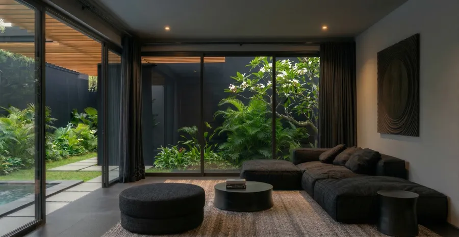 Modern living room rendered in a warm white material palette